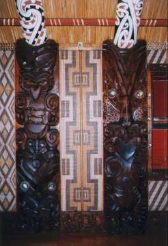 One of the 28 wall slabs representing a group of Maori tribes.